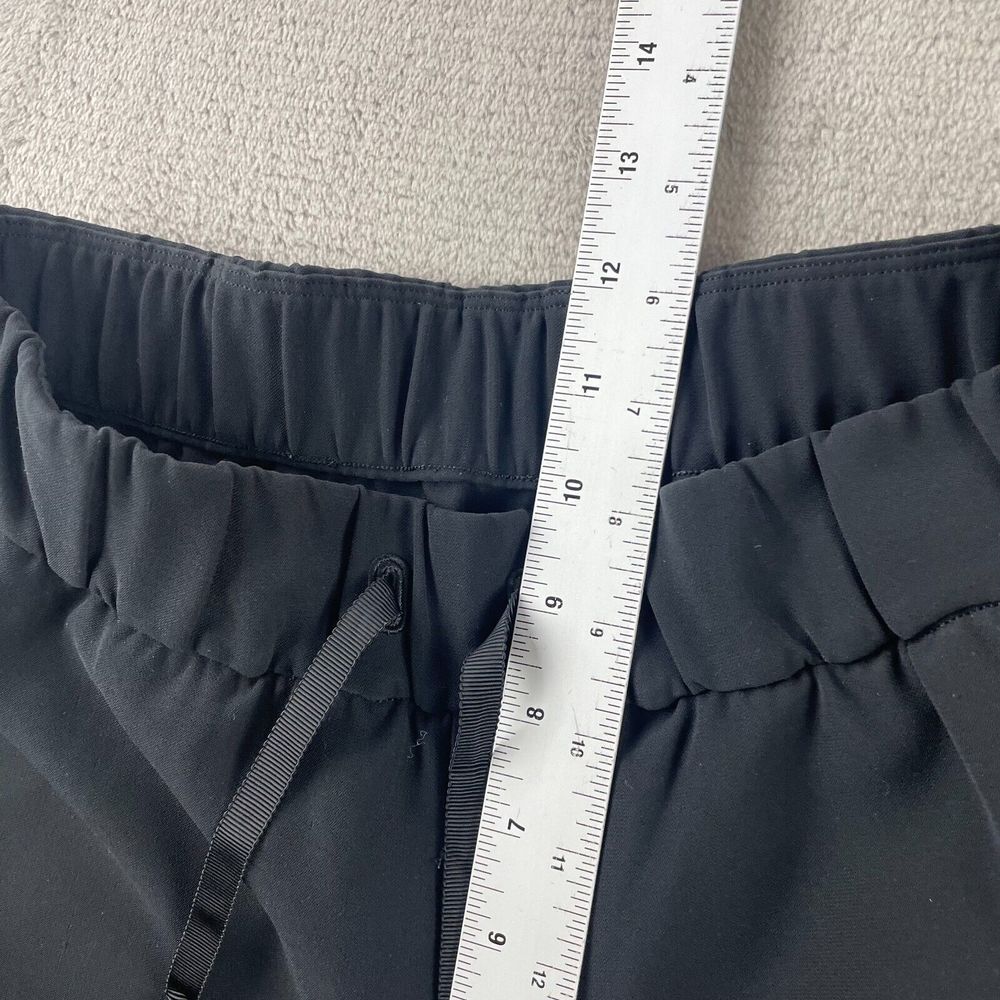 Lululemon On The Fly Jogger‎ Women 4 Black Drawcord Pockets Gym Travel Pants - Picture 7 of 8